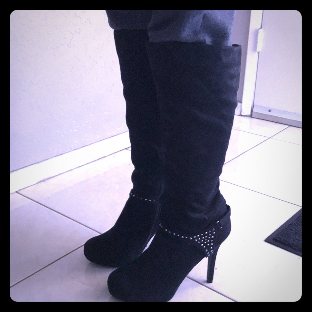Black 5” heeled boots by: Madeline Stuart